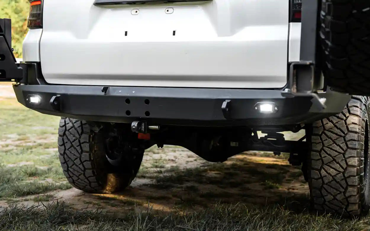 Image showing the surface mount LED lights, recovery points, and tow hitch on the Backwoods Adventure Mods 5th Gen Toyota 4Runner Hi-Lite High Clearance Dual Swing Out Rear Bumper