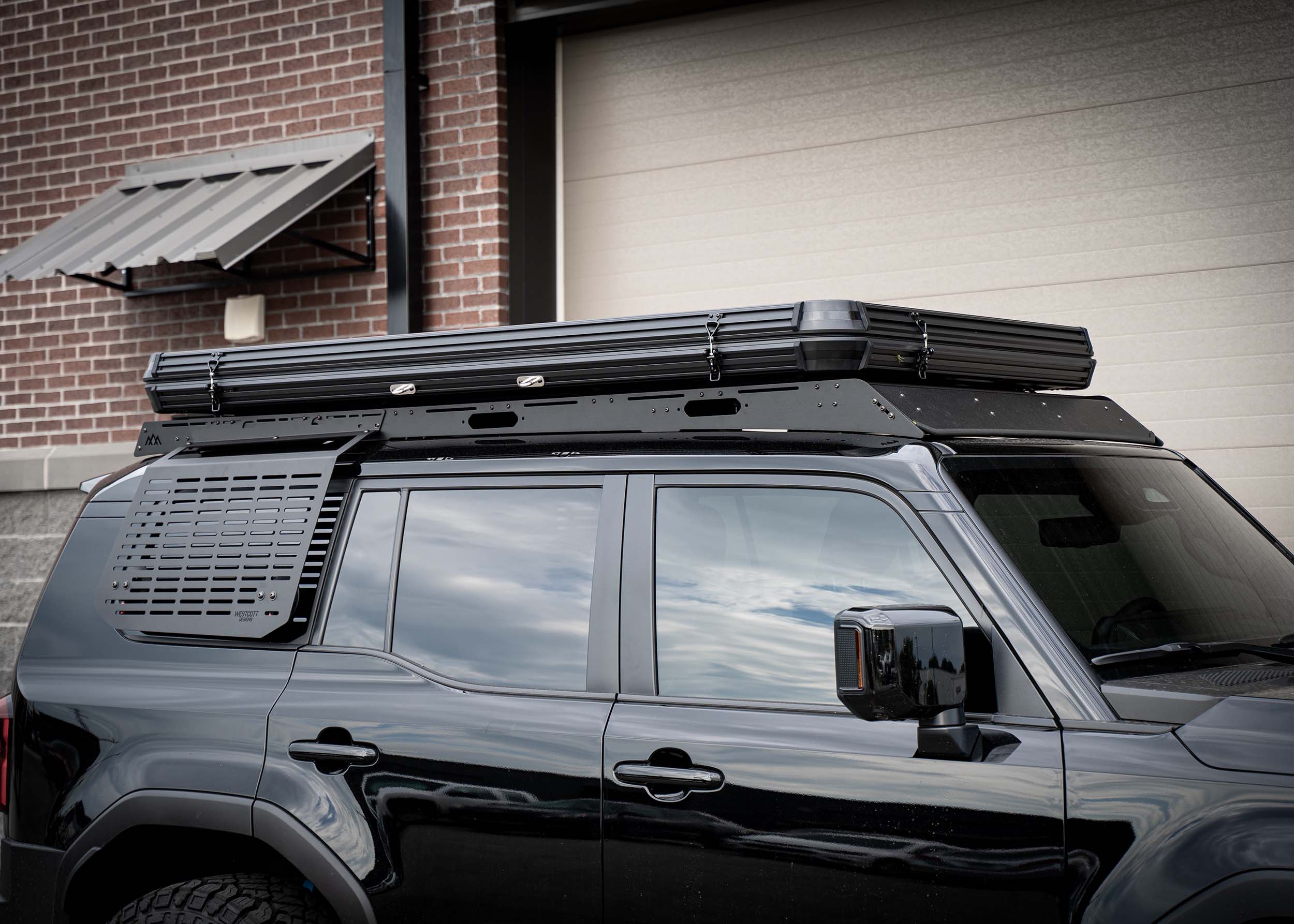 Toyota Land Cruiser 250 DRIFTR roof rack by Backwoods Adventure Mods installed on a new Toyota Landcruiser