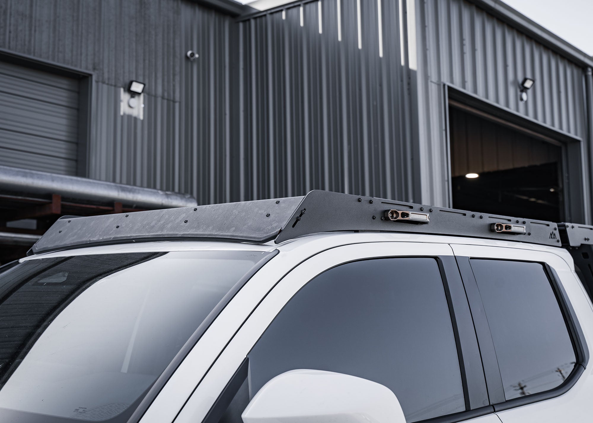 Front view of 2024 Tacoma Backwoods Adventure Mods DRIFTR Roof Rack 