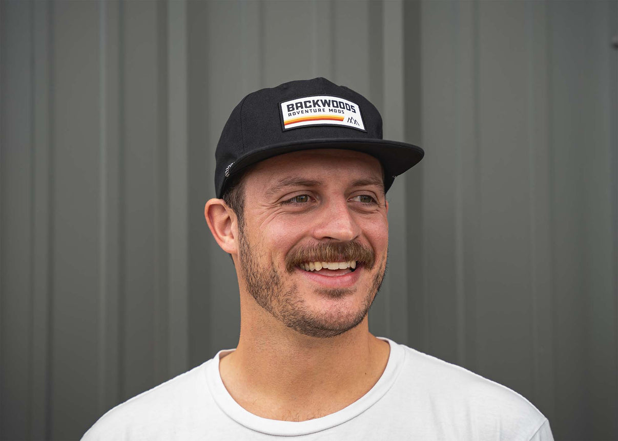 Man wearing black Backwoods Adventure Mods Heritage Rope hat