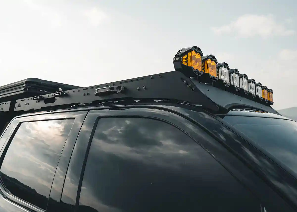 Side profile image of the Backwoods Adventure Mods DRIFTR roof rack installed on a 3rd Gen Toyota Tundra with LED off road lights mounted onthe roof rack
