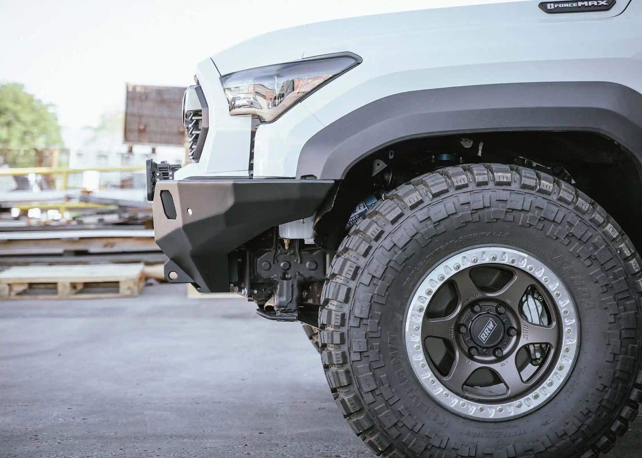 Driver-side view of Backwoods Adventure Mods 2024+ Toyota Tacoma Hi-Lite hybrid aluminum Front Bumper for 4th Gen Tacoma