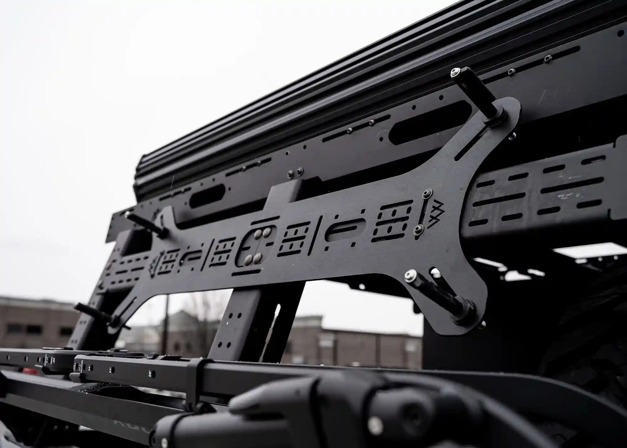 Close up of the installation hardware for the Backwoods Adventure Mods Dogbone Universal Traction Board Mount for off road recovery boards