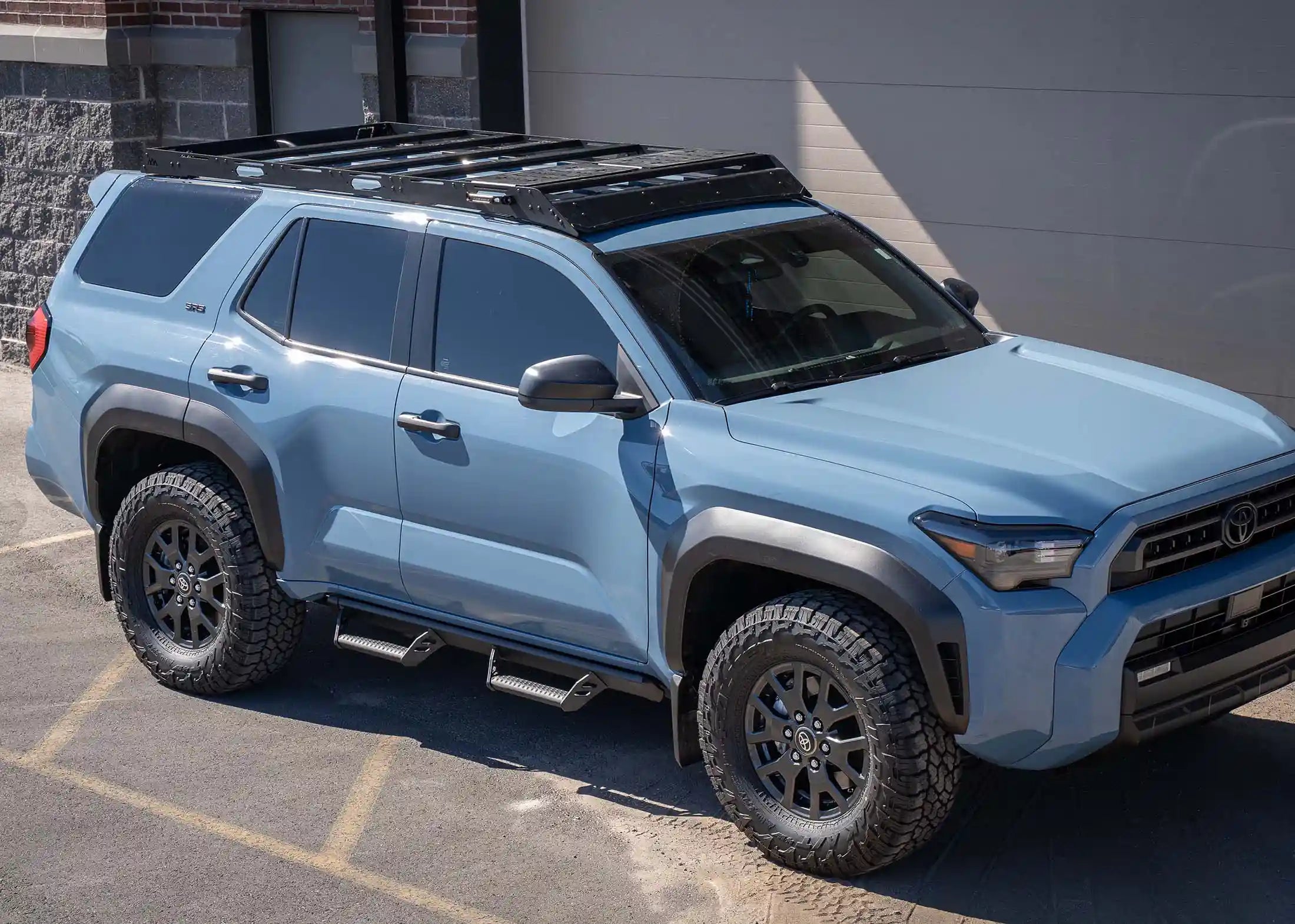 DRIFTR 6th Gen 4Runner Roof Rack from Backwoods Adventure Mods installed on a light blue 2025 Toyota 4Runner