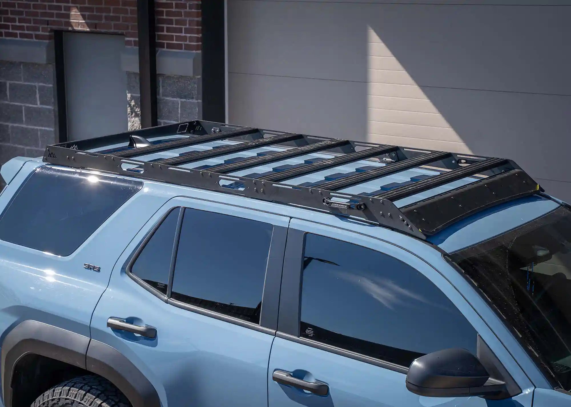 Backwoods Adventure Mods DRIFTR 6th Gen 4Runner Roof Rack installed on a blue 2025 Toyota 4Runner
