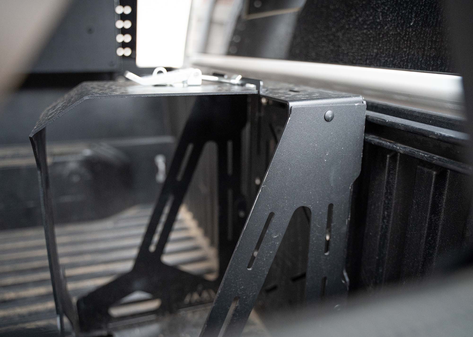 Close up of the Backwoods Adventure Mods Jerry Can Holder Mount powder coat finish