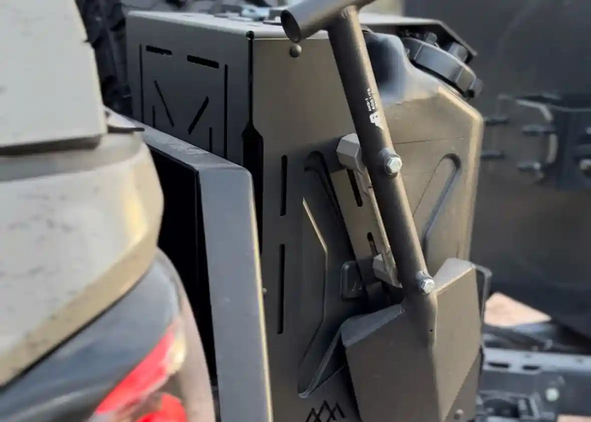 Backwoods Adventure Mods Jerry Can Holder Mount with an Agency 6 off road shovel mounted to the side