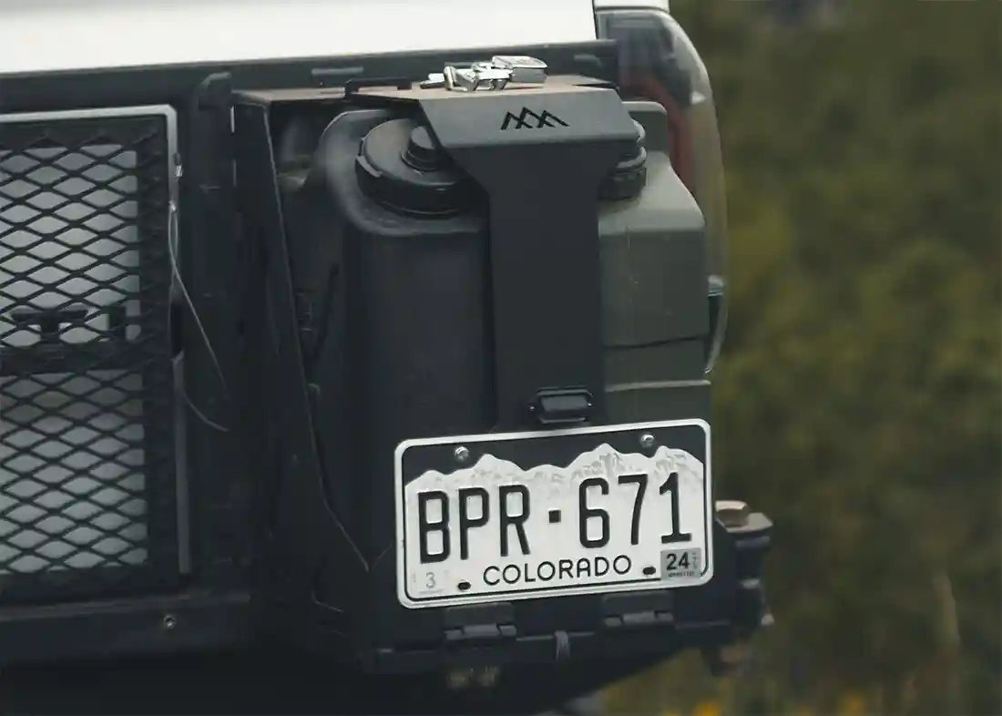 Image of a Backwoods Adventure Mods Dual Jerry Can Holder Mount installed