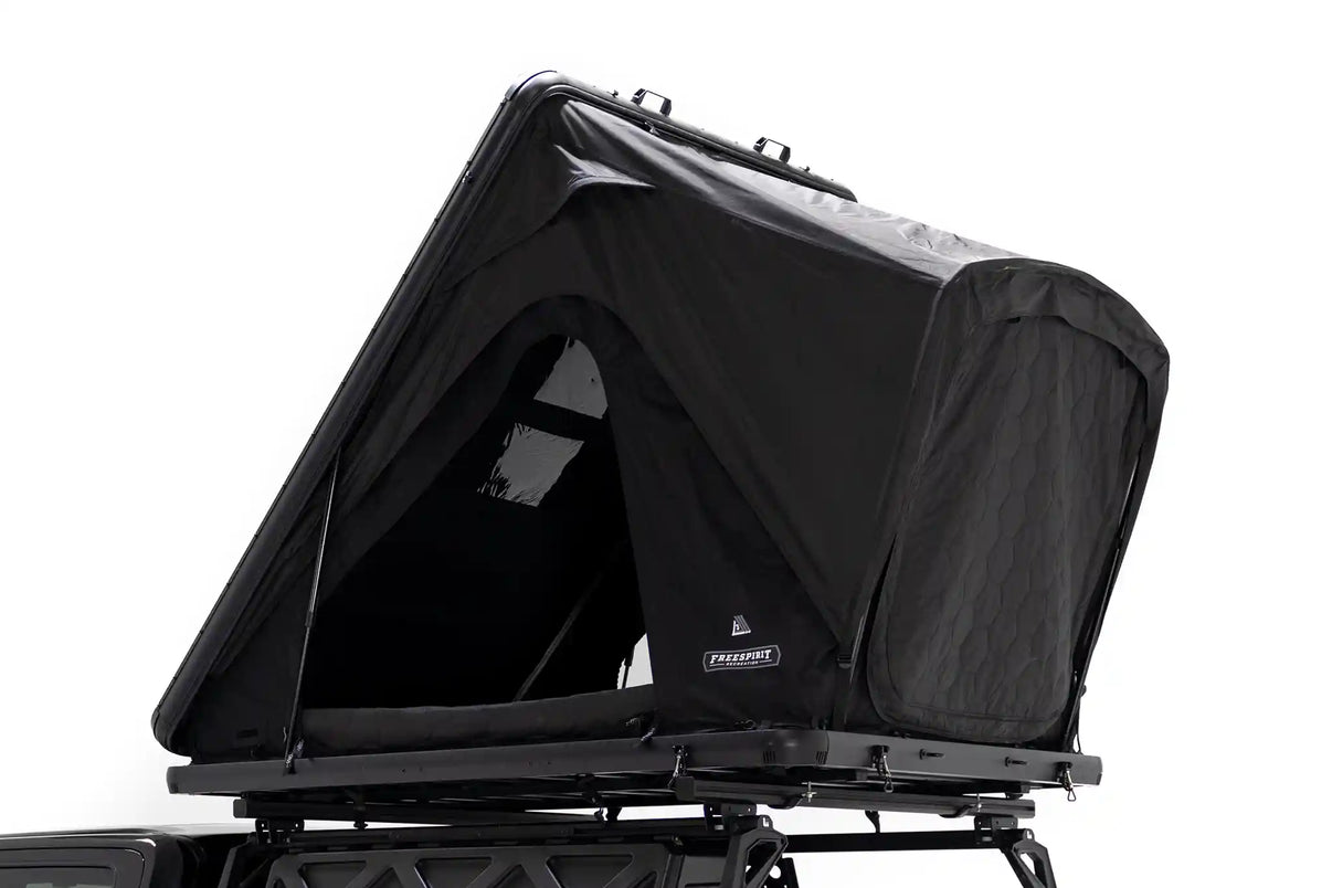 Free Spirit Recreation Aspen Lite XL rooftop tent installed and set up on a truck bed rack | Backwoods Adventure Mods