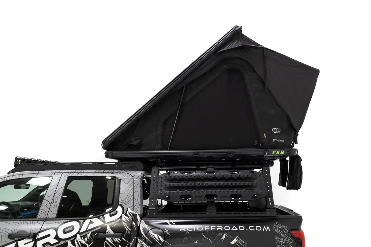Side profile, close up photo of FSR Aspen Pro Standard rooftop tent from Freespirit Recreation mounted on the bed of a short bed Toyota Tacoma pickup. | Backwoods Adventure Mods