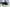 Side-facing image of the FSR Kali King hardshell roof top tent from Freespirit Recreation fully deployed with entry door and windows cloased and ladder collapsed. | Backwoods Adventure Mods