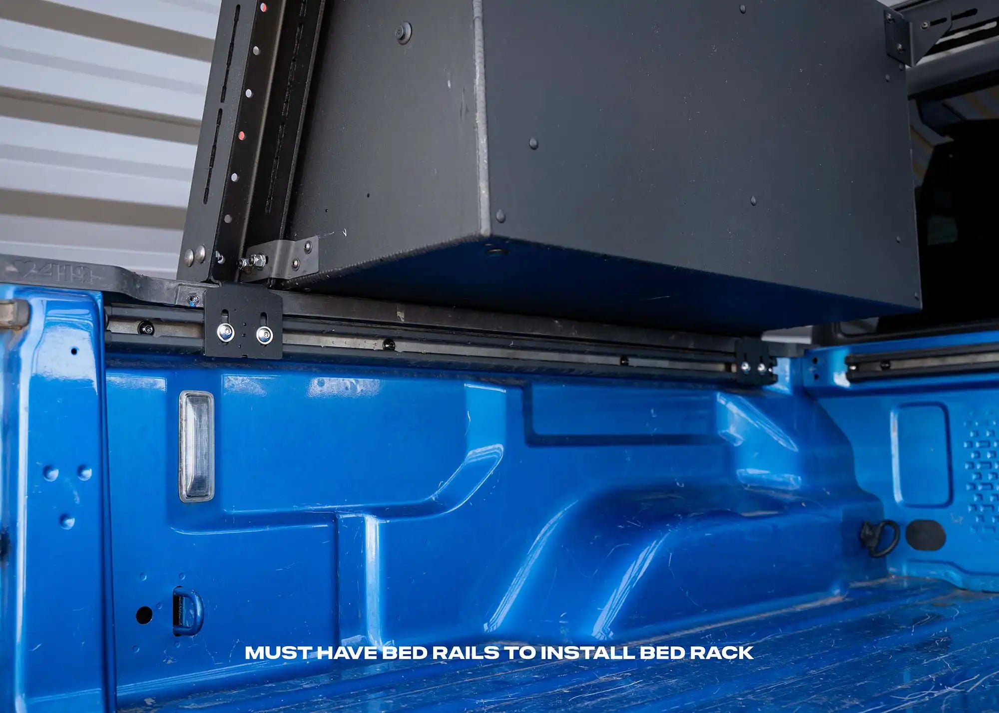 Close up of the Jeep Gladiator Bed Rack installation mounts for factory bed rail tracks