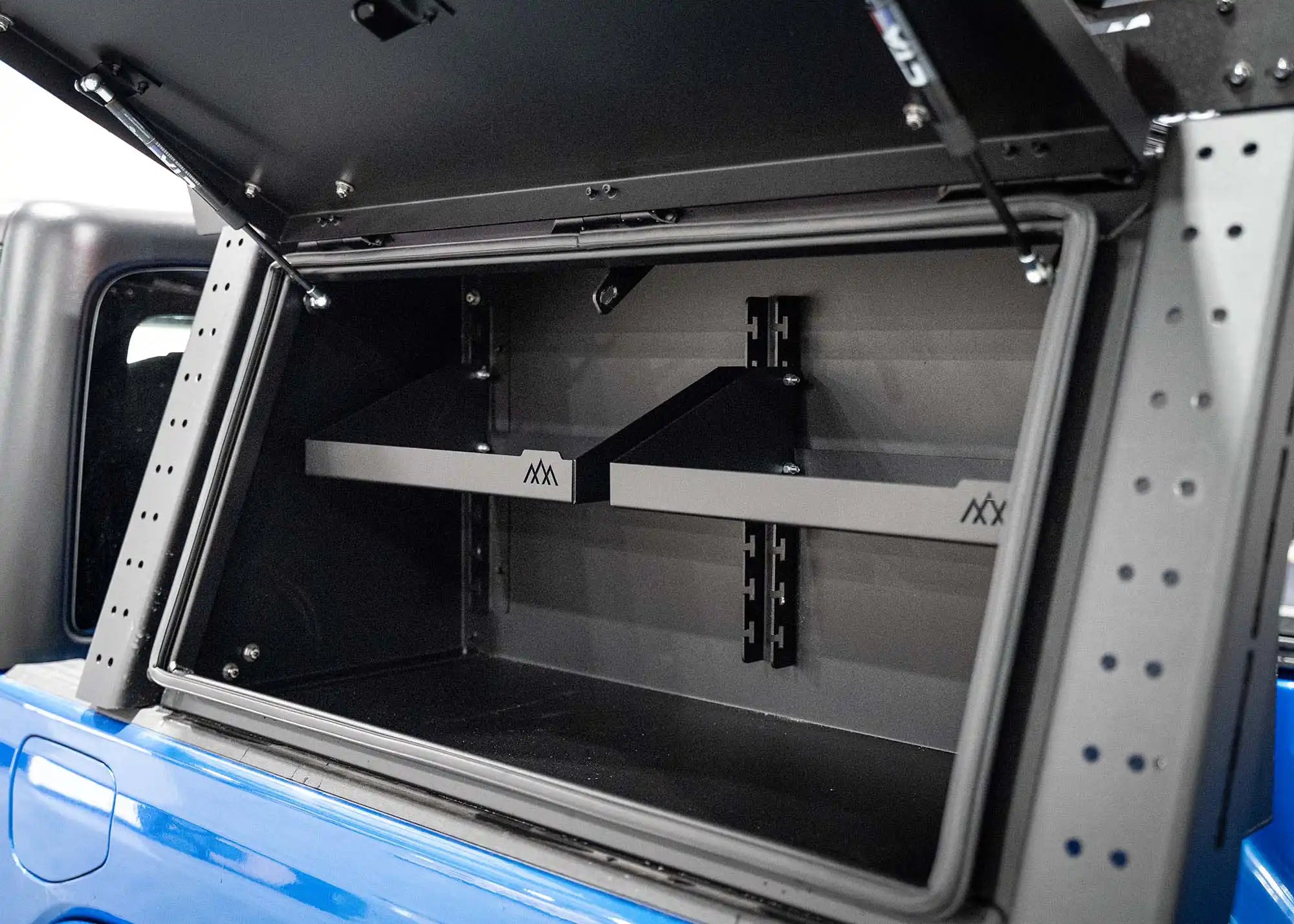 Close up of the Jeep Gladiator Bed Rack Storage Box interior adjustable shelving