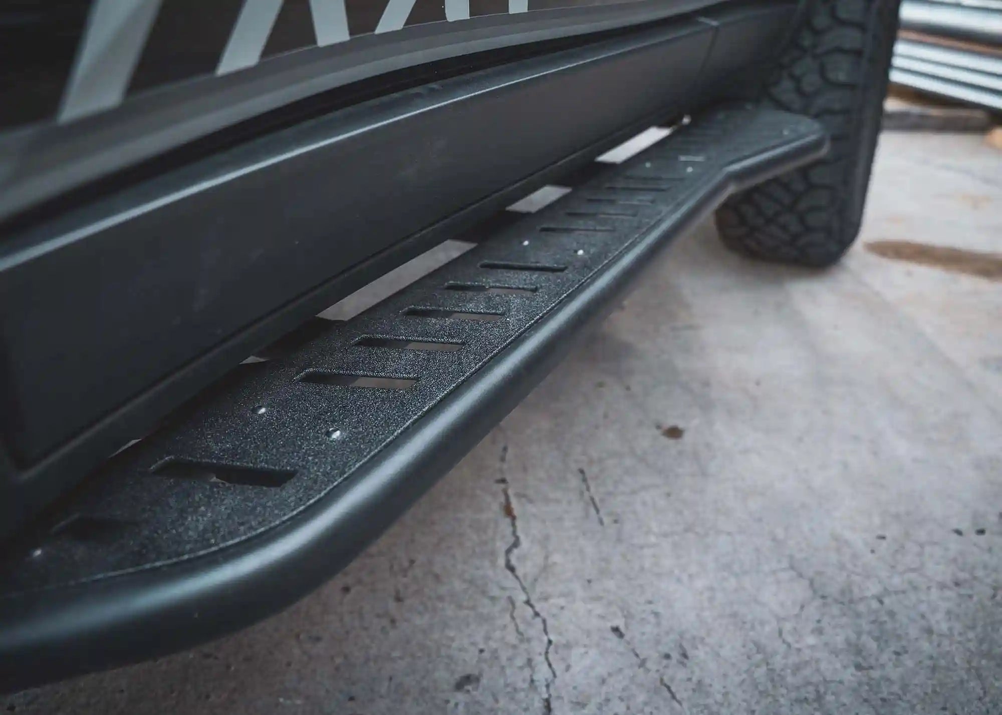 Close up of the top of the Land Cruiser 250 Rock Sliders from Backwoods Adventure Mods