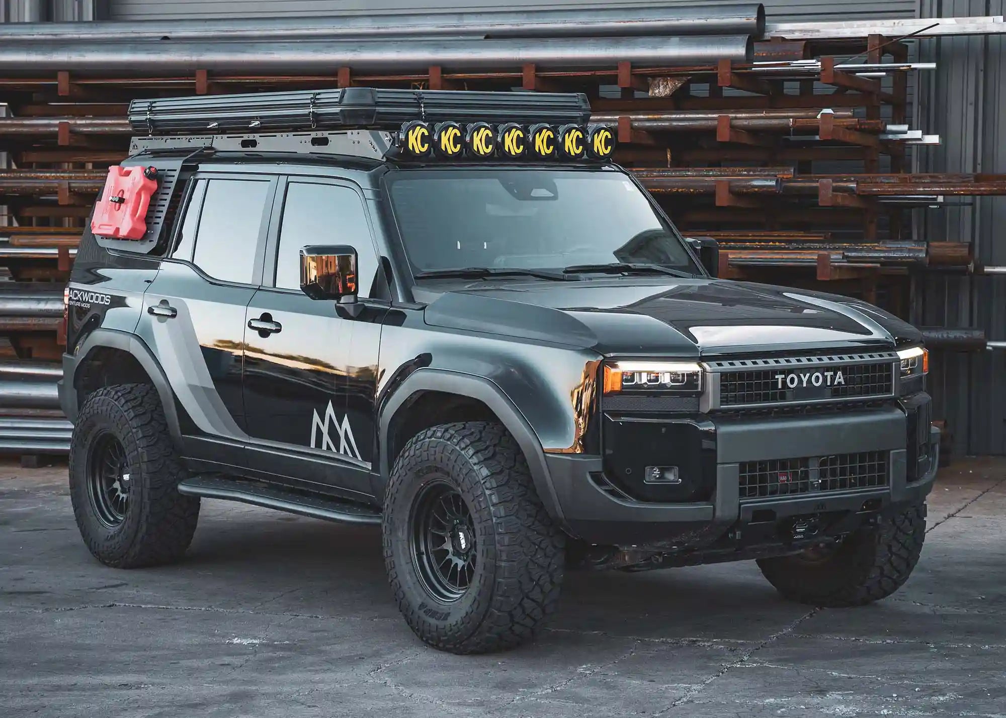 LC250 Front Bumper for Land Cruiser 250 from Backwoods Adventure Mods installed on a black 2024 Land Cruiser overland build