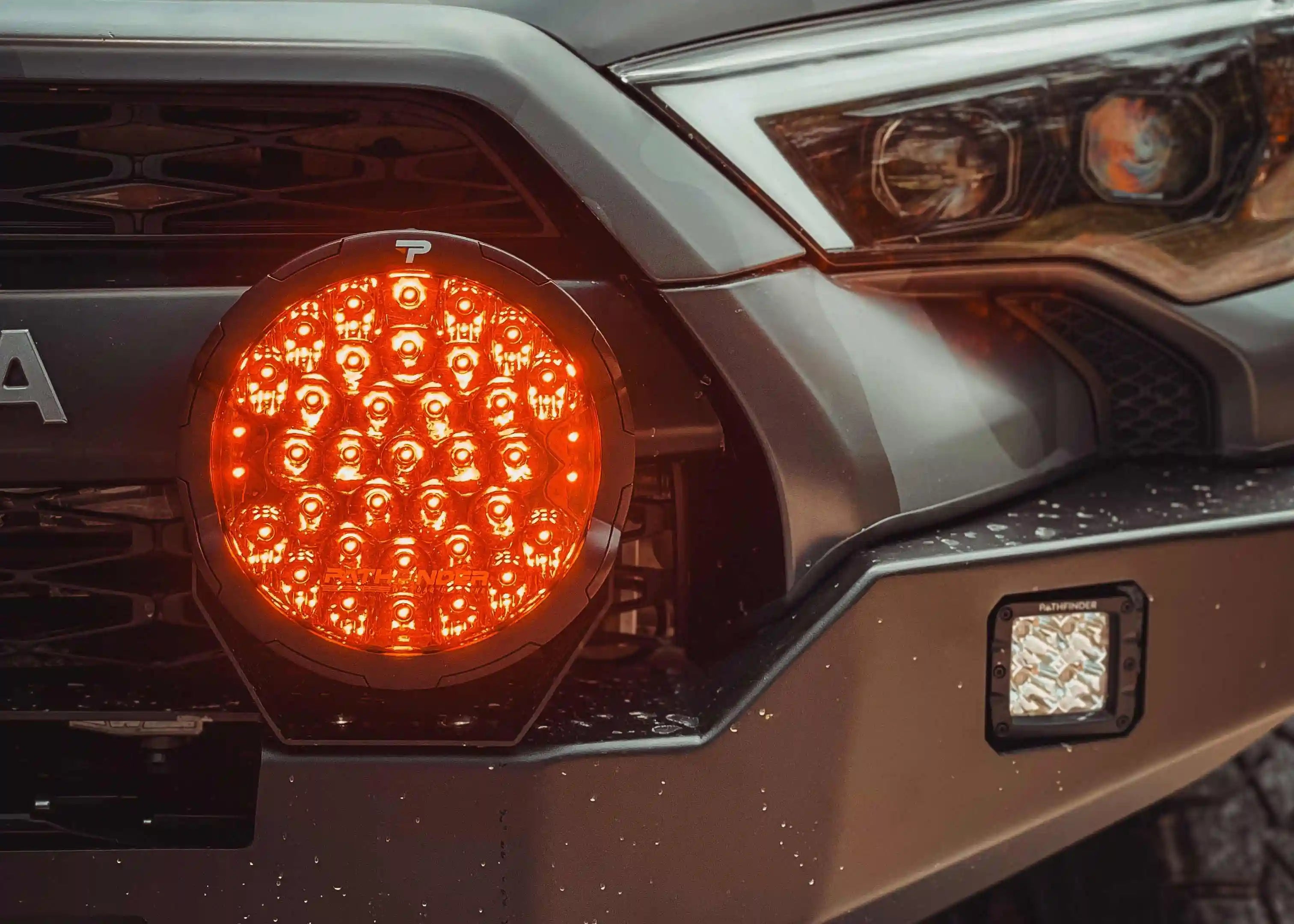 Pathfinder PROWLR 9 inch LED Off Road Driving Light installed on a Backwoods Adventure Mods Hi-Lite series Toyota 4Runner high clearance bumper