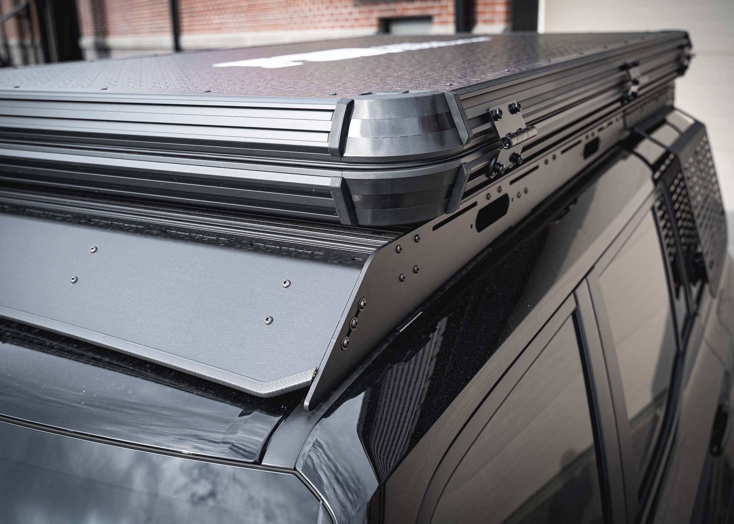 Toyota Landcruiser 250 with Backwoods Adventure Mods DRIFTR roof rack and roof top tent installed