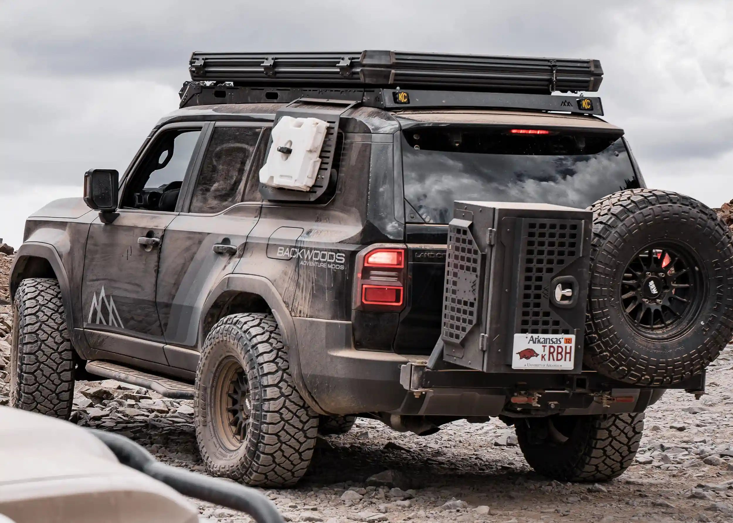 LC250 Toyota Land Cruiser 250 driving off road with a Backwoods Adventure Mods DRIFTR roof rack installed