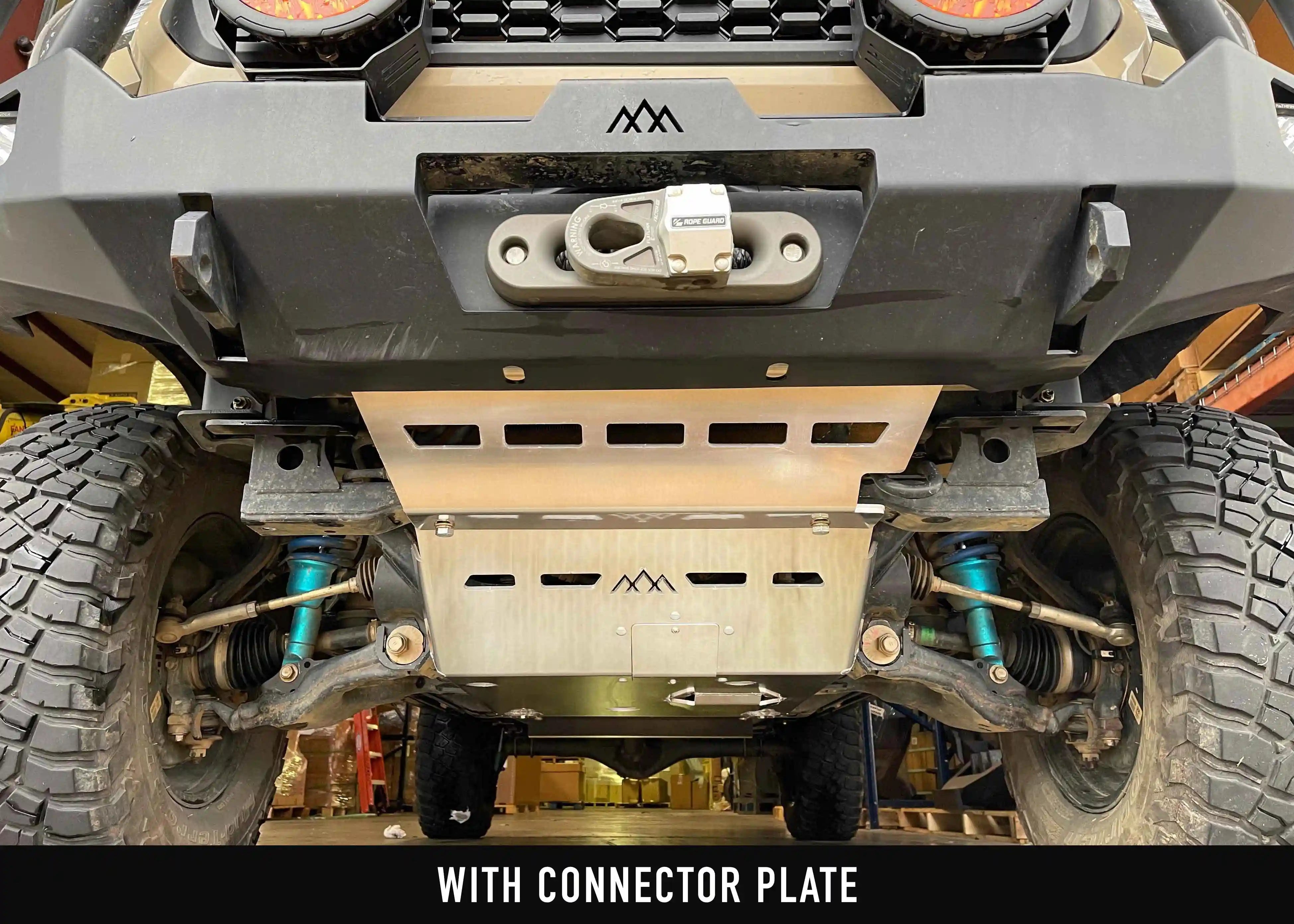 Installed view of Aluminum Connector Skid Plate for Backwoods Adventure Mods Hi-Lite Series 2005+ Toyota Tacoma hybrid off road high clearance bumpers