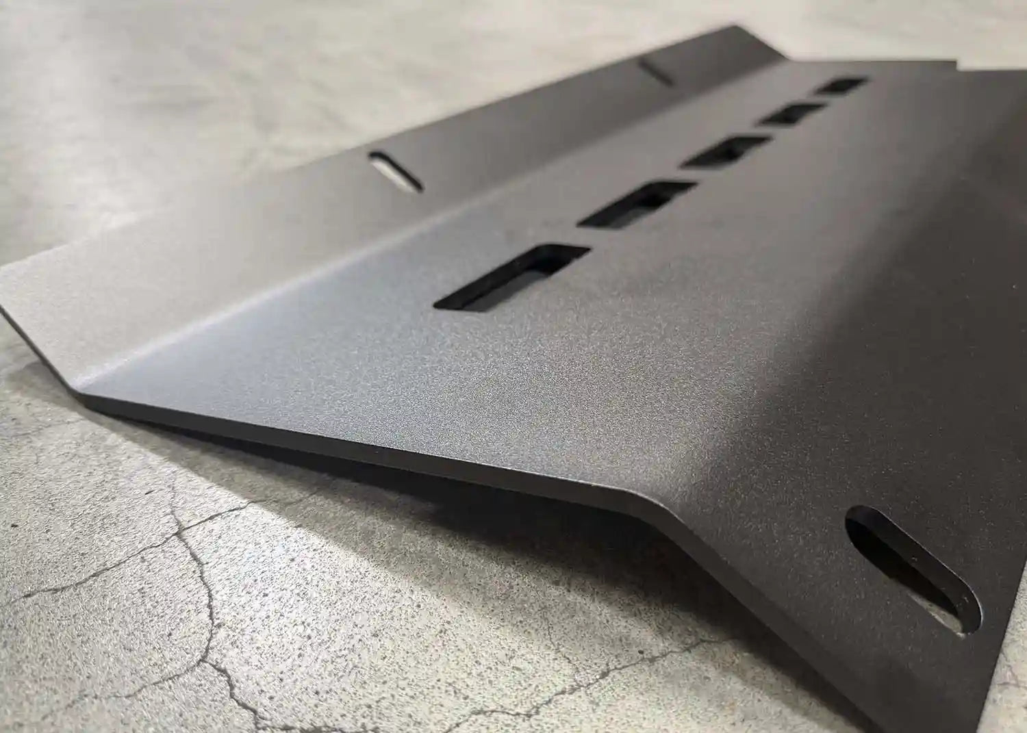 Detailed view of the Aluminum Skid Plate Connector for Backwoods Adventure Mods Hi-Lite Series 2005-2023 Toyota Tacoma hybrid off road high clearance bumpers