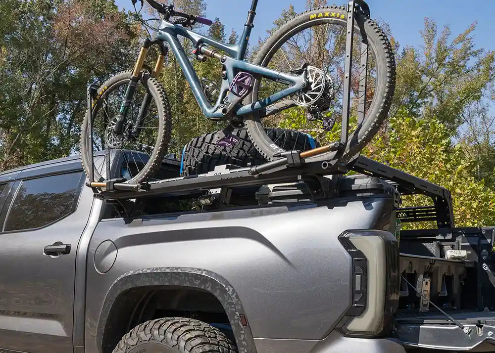 Backwoods Adventure Mods Toyota Tundra Mid Height Bed Rack with bike tray mounting accessory installed