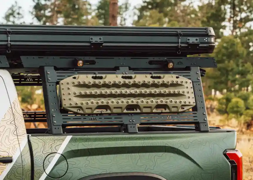 Backwoods Adventure Mods Truck Bed Rack System Starter Bundle installed on a 3rd Gen Toyota Tundra with off road accessories mounted on the sides