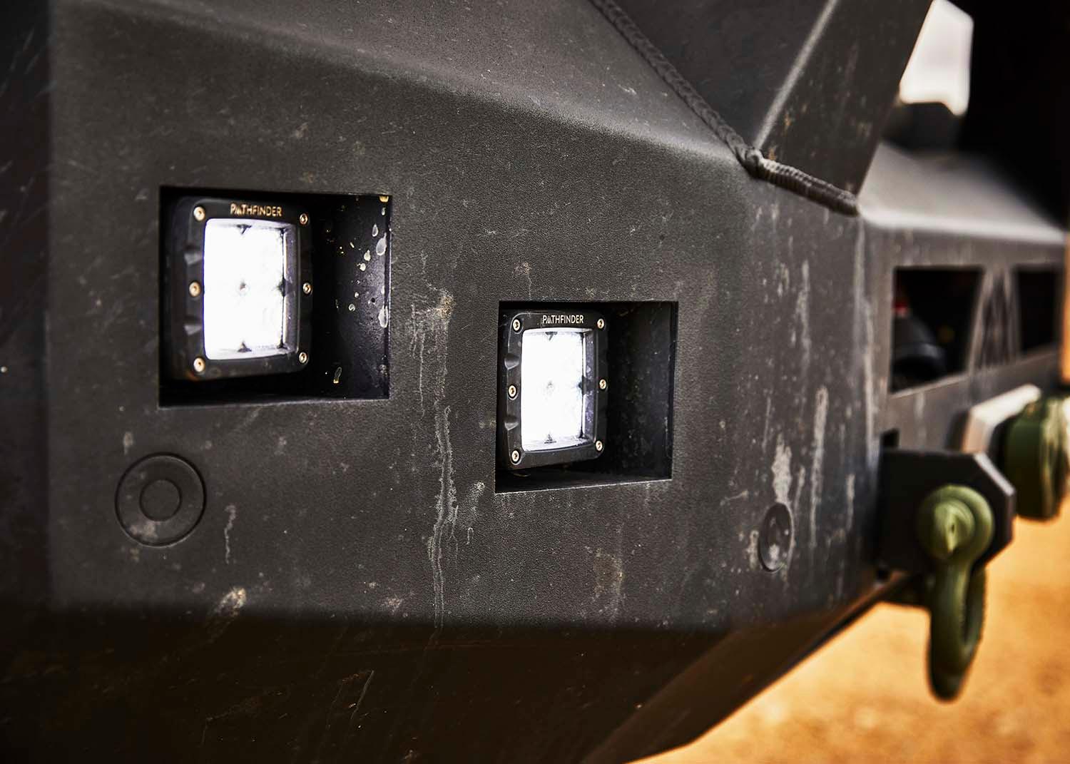 Pathfinder surface mount off road LED light pod set installed on a Backwoods Adventure Mods Hi-Lite series hybrid high-clearance off road bumper for Toyota  Trucks and SUVs